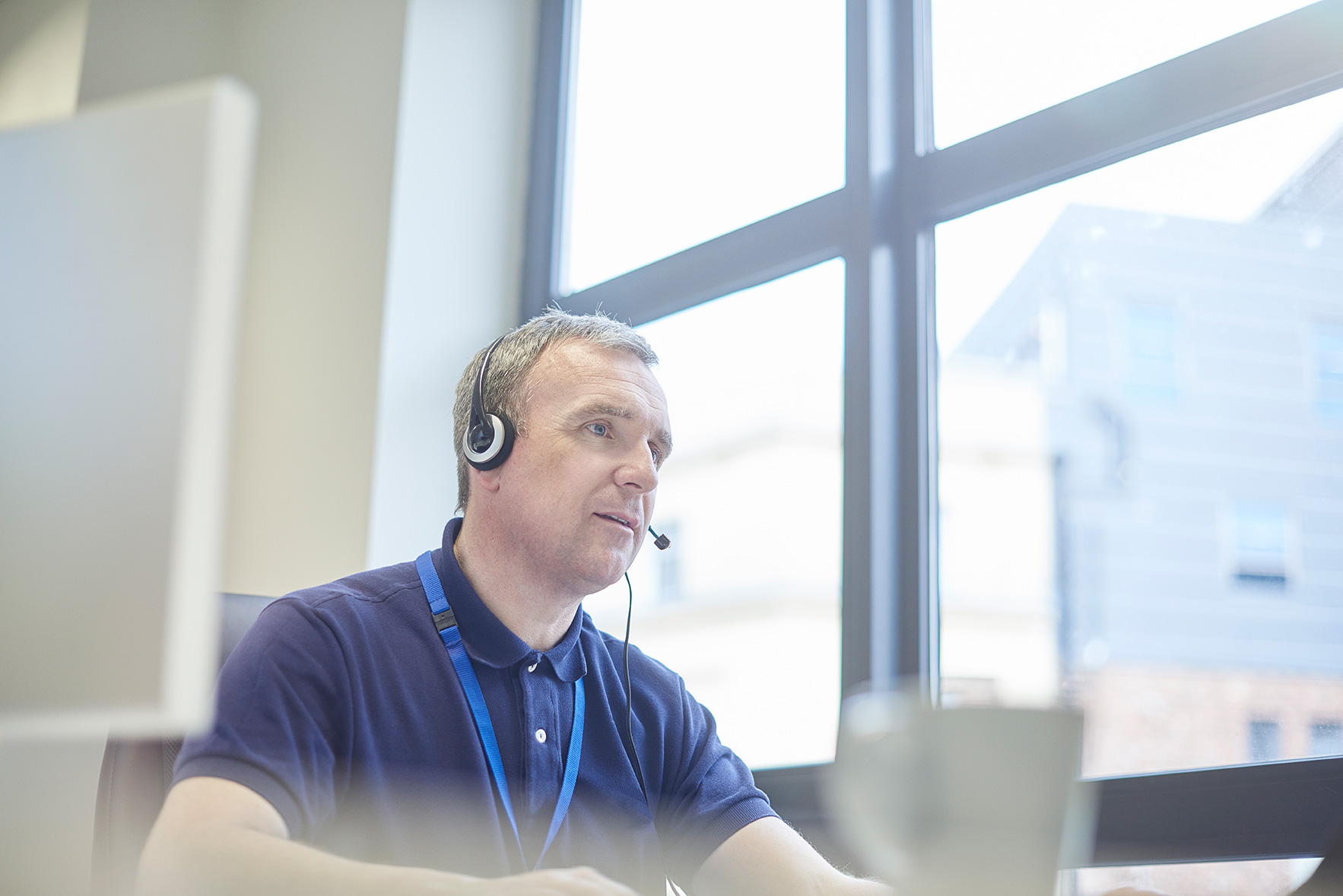 IT support worker looking at a screen